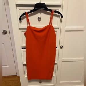 Orange mini dress. In good condition only worn once. Runs kinda big